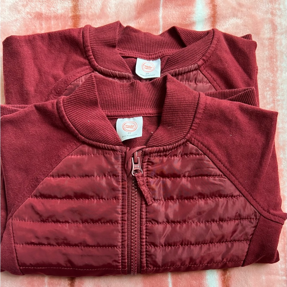 Wine-colored jackets, very pretty.